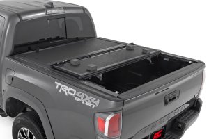 Toyota Tacoma Hard Low Profile Bed Cover - Rear - Rough Country - Tri-Fold - '16-'23 Toyota Tacoma Hard Low Profile Bed Cover - Rear - Rough Country - Tri-Fold - '16-'23
